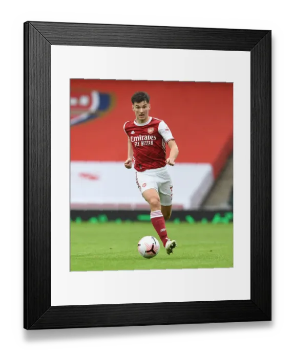 Framed Print : Arsenal's Kieran Tierney in Action against Sheffield United (2020-21): A Behind-Closed-Doors Premier League Encounter