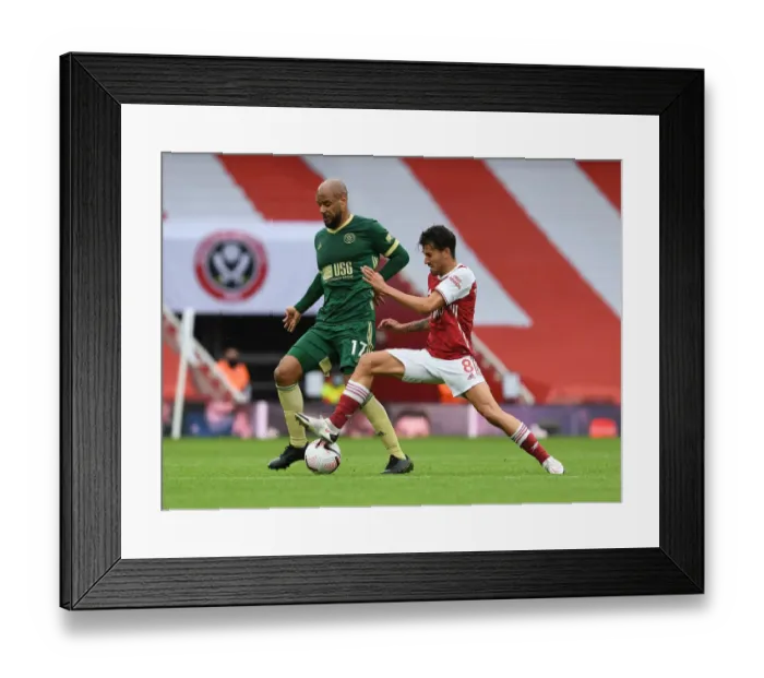Framed Print : Empty Emirates: A Premier League Showdown - Dani Ceballos vs. David McGoldrick Framed Print : Empty Emirates: A Premier League Showdown - Dani Ceballos vs. David McGoldrick