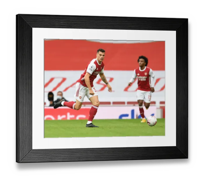 Framed Print : Arsenal's Granit Xhaka in Action: 2020-21 Premier League Match Against Sheffield United (Behind Closed Doors) Framed Print : Arsenal's Granit Xhaka in Action: 2020-21 Premier League Match Against Sheffield United (Behind Closed Doors)