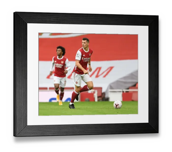 Framed Print : Arsenal's Xhaka in Action: Emirates Stadium Showdown Against Sheffield United (2020-21) Framed Print : Arsenal's Xhaka in Action: Emirates Stadium Showdown Against Sheffield United (2020-21)