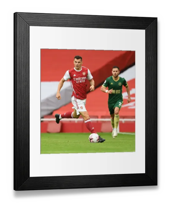Framed Print : Arsenal's Granit Xhaka in Action at Empty Emirates: Arsenal vs Sheffield United, Premier League 2020-21 Framed Print : Arsenal's Granit Xhaka in Action at Empty Emirates: Arsenal vs Sheffield United, Premier League 2020-21
