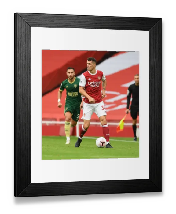 Framed Print : Arsenal's Granit Xhaka in Action Against Sheffield United: 2020-21 Premier League Framed Print : Arsenal's Granit Xhaka in Action Against Sheffield United: 2020-21 Premier League