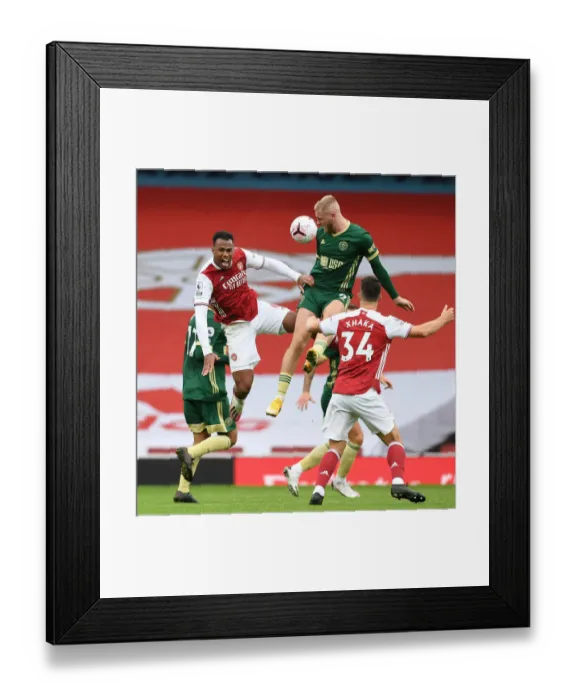 Framed Print : Gabriel vs McBurnie: A Battle at Empty Emirates - Arsenal vs Sheffield United, Premier League 2020-21