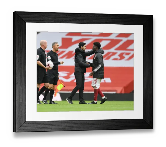 Framed Print : Arsenal's Bukayo Saka Scores Winning Goal Against Sheffield United in Empty Emirates Stadium Framed Print : Arsenal's Bukayo Saka Scores Winning Goal Against Sheffield United in Empty Emirates Stadium
