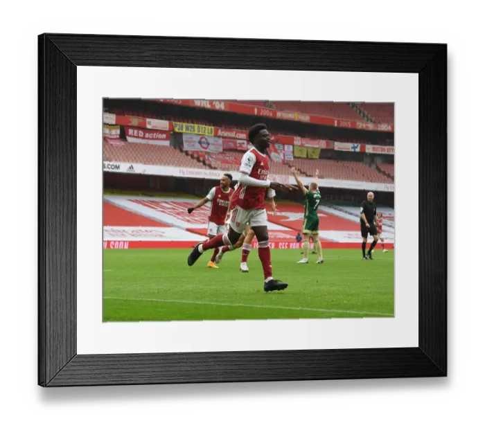 Framed Print : Arsenal's Bukayo Saka Scores First Goal of the Season Against Sheffield United in Empty Emirates Stadium Framed Print : Arsenal's Bukayo Saka Scores First Goal of the Season Against Sheffield United in Empty Emirates Stadium