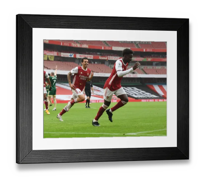 Framed Print : Bukayo Saka Scores First Arsenal Goal in Empty Emirates Stadium (2020-21) Framed Print : Bukayo Saka Scores First Arsenal Goal in Empty Emirates Stadium (2020-21)
