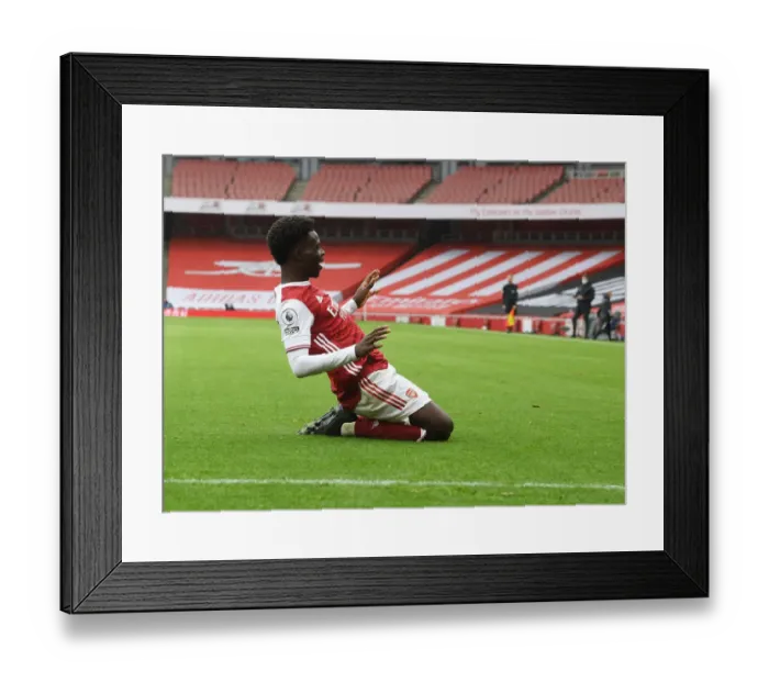 Framed Print : Bukayo Saka Scores First Goal in Empty Emirates: Arsenal's Historic Victory over Sheffield United in the 2020-21 Premier League
