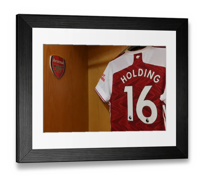 Framed Print : Arsenal's Empty Emirates: Rob Holding Prepares for Sheffield United Clash (2020-21)