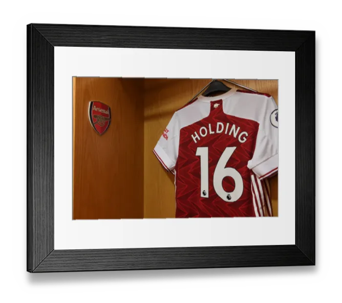 Framed Print : Arsenal's Empty Emirates: Rob Holding Gears Up for Sheffield United Clash (2020-21) Framed Print : Arsenal's Empty Emirates: Rob Holding Gears Up for Sheffield United Clash (2020-21)