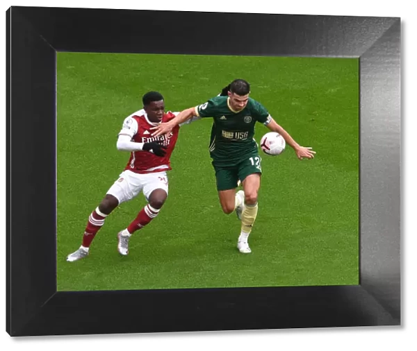 Arsenal vs Sheffield United: Eddie Nketiah Clashes with John Egan in Premier League Showdown