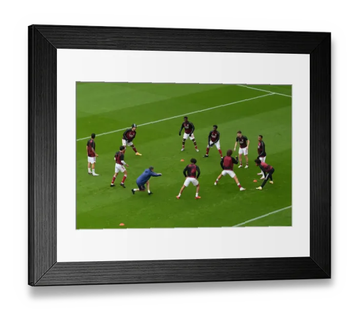 Framed Print : Arsenal Players Warm Up Ahead of Arsenal v Sheffield United in 2020-21 Premier League