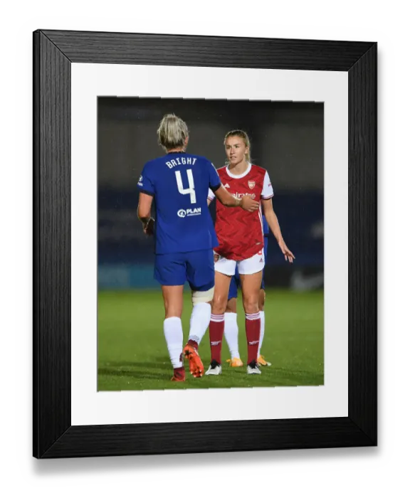 Framed Print : Leah Williamson and Millie Bright Share a Moment of Sportsmanship: Chelsea Women vs Arsenal Women in Continental Cup Clash