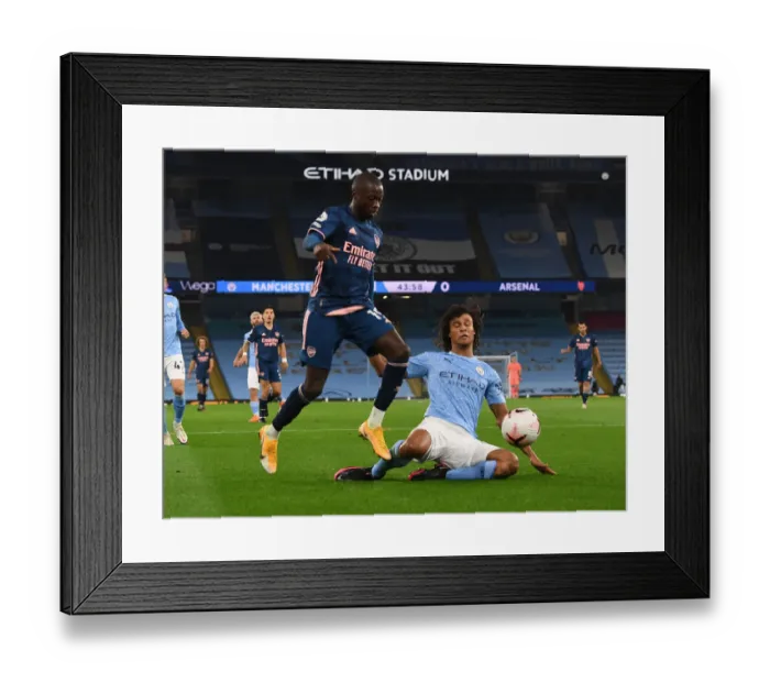 Framed Print : Pepe vs Ake: Manchester City vs Arsenal, Premier League 2020-21 - Empty Etihad Stadium Battle Framed Print : Pepe vs Ake: Manchester City vs Arsenal, Premier League 2020-21 - Empty Etihad Stadium Battle