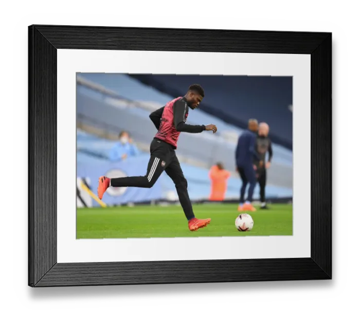 Framed Print : Thomas Partey's Pre-Match Routine: Manchester City vs. Arsenal (2020-21) Framed Print : Thomas Partey's Pre-Match Routine: Manchester City vs. Arsenal (2020-21)