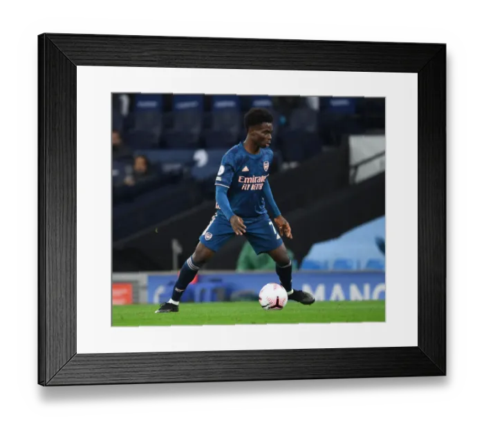 Framed Print : Behind Closed Doors: Bukayo Saka in Action - Arsenal vs. Manchester City, 2020-21 Premier League