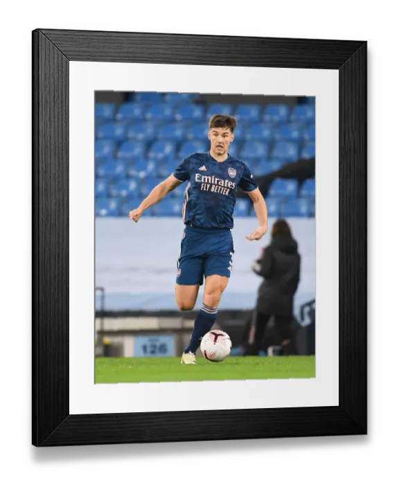 Framed Print : Arsenal's Kieran Tierney at Manchester City: 2020-21 Premier League Clash Amidst Empty Stands Framed Print : Arsenal's Kieran Tierney at Manchester City: 2020-21 Premier League Clash Amidst Empty Stands