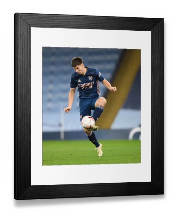 Framed Print : Arsenal's Kieran Tierney in Empty Etihad Stadium: 2020-21 Premier League Clash with Manchester City