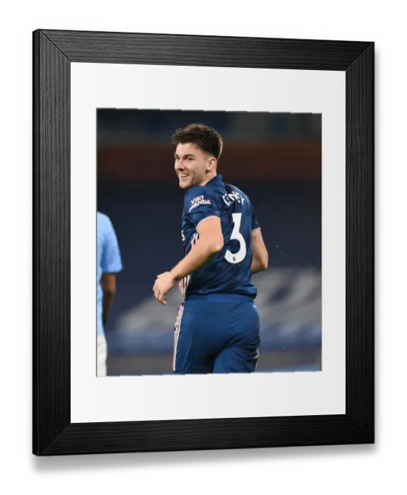 Framed Print : Arsenal's Kieran Tierney Faces Manchester City in Empty Etihad Stadium (2020-21 Premier League)