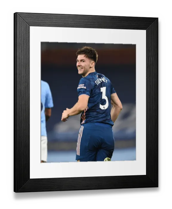 Framed Print : Arsenal's Kieran Tierney Faces Manchester City in Empty Etihad Stadium: 2020-21 Premier League Match Amidst COVID-19 Restrictions