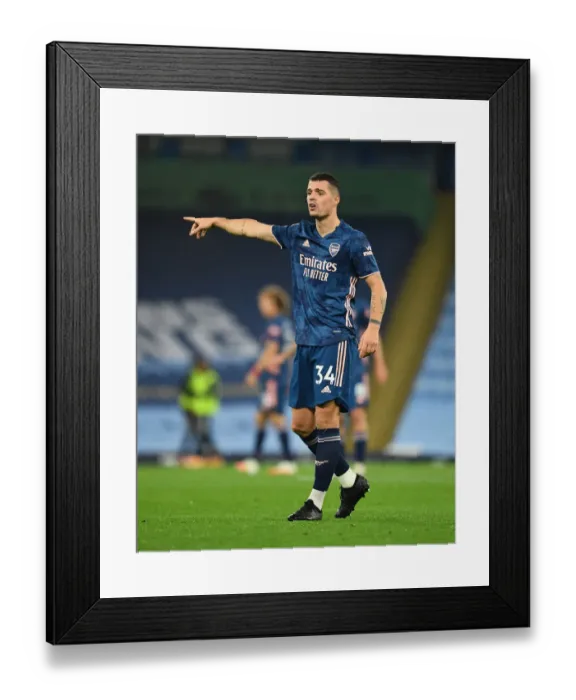 Framed Print : Xhaka at Empty Etihad: Manchester City vs. Arsenal, Premier League 2020-21 Framed Print : Xhaka at Empty Etihad: Manchester City vs. Arsenal, Premier League 2020-21