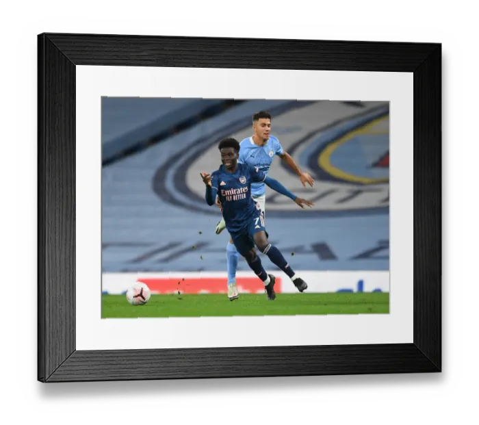 Framed Print : Saka vs Rodrigo: A Premier League Battle - Manchester City vs Arsenal (2020-21) Framed Print : Saka vs Rodrigo: A Premier League Battle - Manchester City vs Arsenal (2020-21)