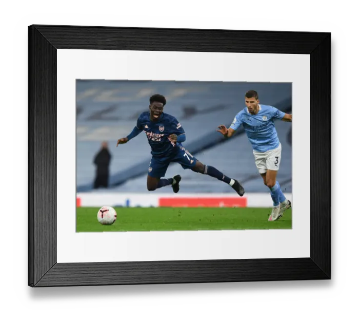 Framed Print : Manchester City vs Arsenal: Bukayo Saka Foul by Ruben Dias, 2020-21 Premier League Framed Print : Manchester City vs Arsenal: Bukayo Saka Foul by Ruben Dias, 2020-21 Premier League
