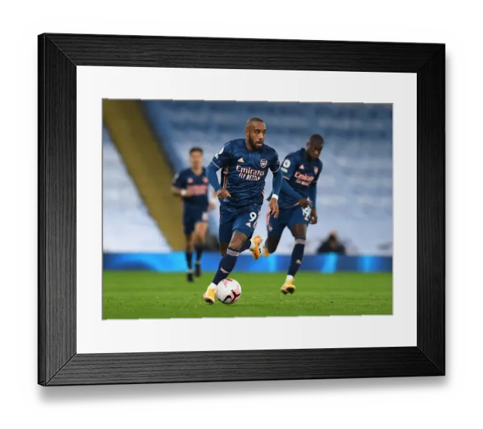 Framed Print : Arsenal's Alexandre Lacazette Faces Manchester City in Premier League Showdown Framed Print : Arsenal's Alexandre Lacazette Faces Manchester City in Premier League Showdown