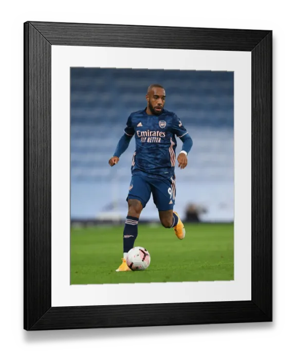 Framed Print : Alexandre Lacazette vs Manchester City: Premier League Showdown