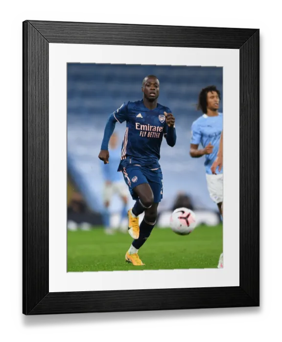 Framed Print : Pepe vs Manchester City: Arsenal's Star Forward Takes on Premier League Rivals Framed Print : Pepe vs Manchester City: Arsenal's Star Forward Takes on Premier League Rivals