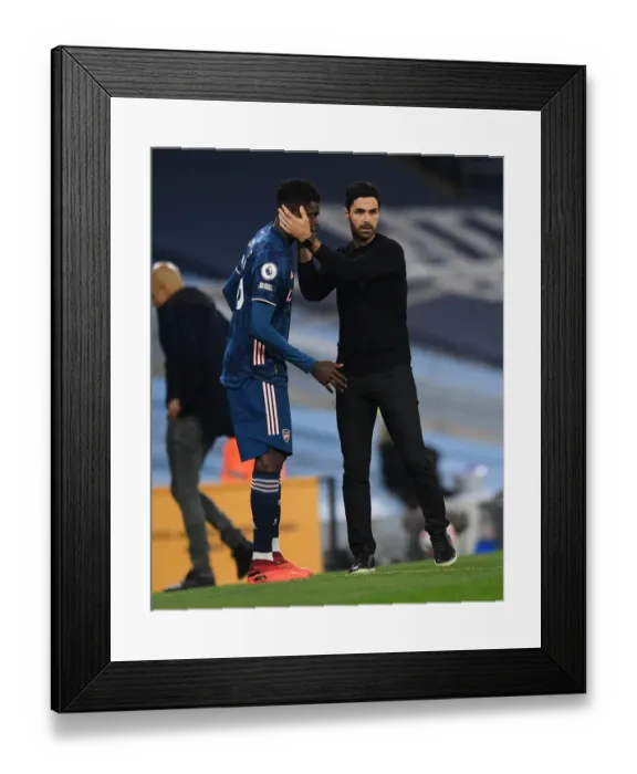 Framed Print : Arsenal's Thomas Partey Receives Strategic Guidance from Mikel Arteta during Manchester City Match (2020-21) Framed Print : Arsenal's Thomas Partey Receives Strategic Guidance from Mikel Arteta during Manchester City Match (2020-21)
