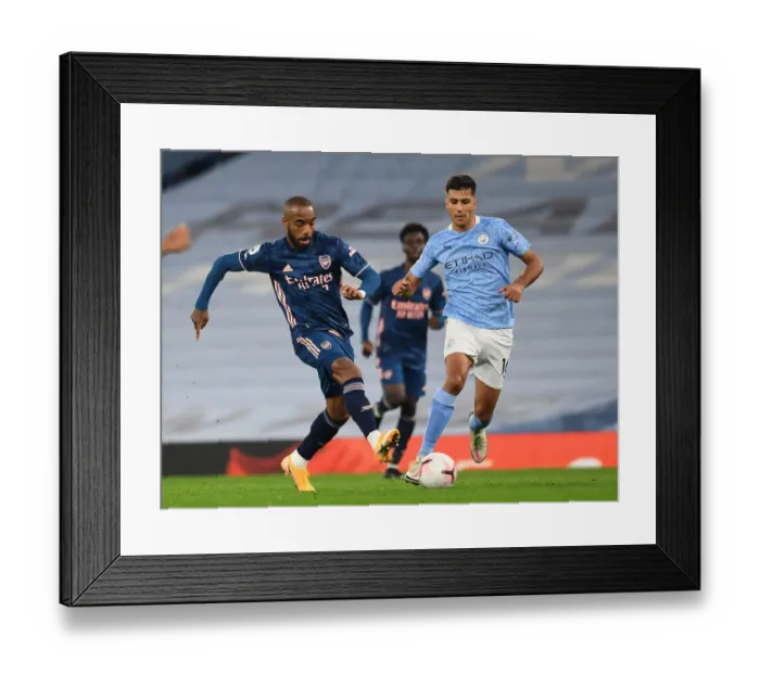 Framed Print : Manchester City vs Arsenal: Lacazette vs Rodrigo - Premier League Showdown Framed Print : Manchester City vs Arsenal: Lacazette vs Rodrigo - Premier League Showdown
