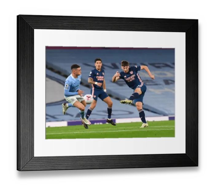 Framed Print : Manchester City vs Arsenal: Tierney's Shot Blocked by Foden in Premier League Clash (2020-21)