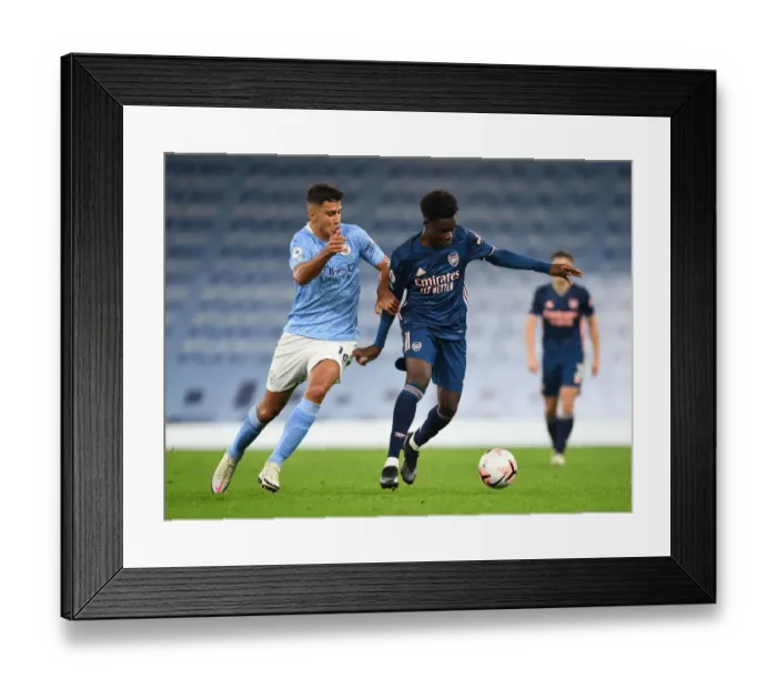 Framed Print : Saka vs Rodrigo: Manchester City vs Arsenal, Premier League Showdown (2020-21)