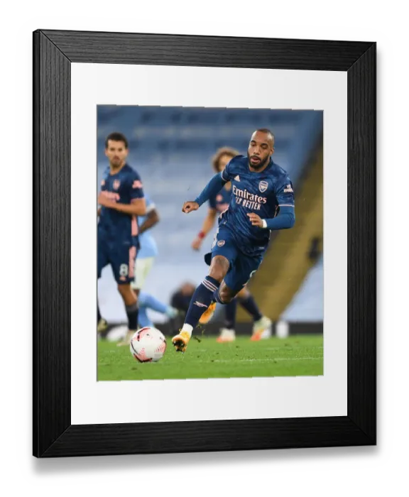 Framed Print : Arsenal's Alex Lacazette at Manchester City's Etihad Stadium during the 2020-21 Premier League Match Framed Print : Arsenal's Alex Lacazette at Manchester City's Etihad Stadium during the 2020-21 Premier League Match