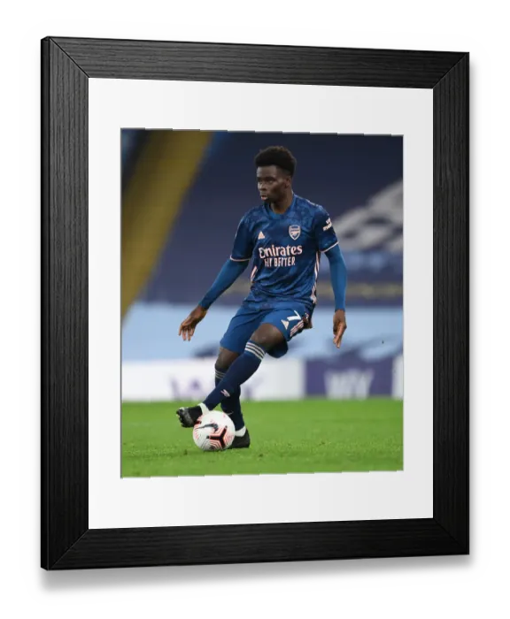 Framed Print : Arsenal's Bukayo Saka at Empty Etihad Stadium: Arsenal vs. Manchester City, 2020-21 Premier League Framed Print : Arsenal's Bukayo Saka at Empty Etihad Stadium: Arsenal vs. Manchester City, 2020-21 Premier League