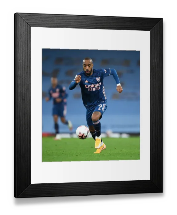 Framed Print : Behind Closed Doors: Alex Lacazette at Etihad Stadium - Arsenal vs. Manchester City, Premier League 2020-21