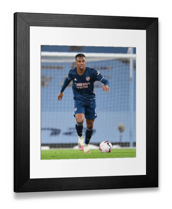Framed Print : Arsenal vs. Manchester City: Empty Etihad Stadium Showdown - Gabriel Faces the Challenge, 2020-21 Premier League