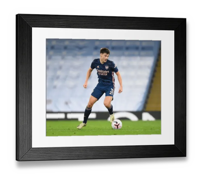 Framed Print : Arsenal's Kieran Tierney Faces Manchester City in Empty Etihad Stadium (2020-21 Premier League) Framed Print : Arsenal's Kieran Tierney Faces Manchester City in Empty Etihad Stadium (2020-21 Premier League)