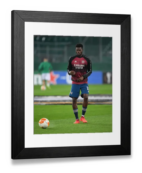 Framed Print : Thomas Partey: Arsenal's Ready Warrior in Europa League Clash vs Rapid Vienna