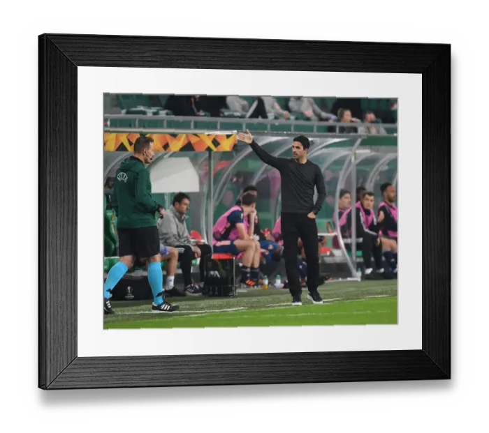 Framed Print : Mikel Arteta Leads Arsenal in Europa League Battle against Rapid Vienna Framed Print : Mikel Arteta Leads Arsenal in Europa League Battle against Rapid Vienna