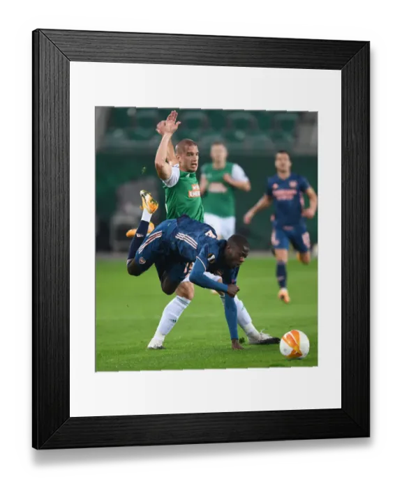 Framed Print : Pepe Foul: Intense Moment in Rapid Vienna vs. Arsenal UEFA Europa League Clash Framed Print : Pepe Foul: Intense Moment in Rapid Vienna vs. Arsenal UEFA Europa League Clash