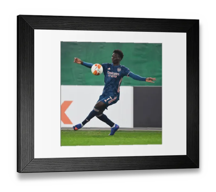 Framed Print : Arsenal's Saka Shines: Rapid Vienna vs Arsenal, UEFA Europa League 2020-21 Framed Print : Arsenal's Saka Shines: Rapid Vienna vs Arsenal, UEFA Europa League 2020-21