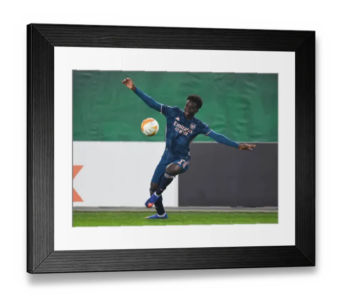 Framed Print : Bukayo Saka in Action: Arsenal vs Rapid Vienna, UEFA Europa League 2020-21
