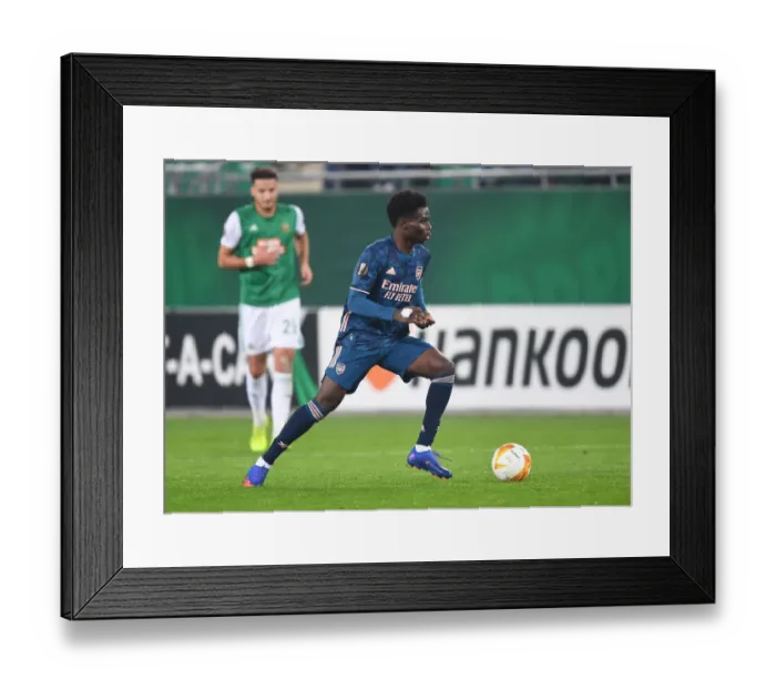 Framed Print : Bukayo Saka's Standout Performance: Arsenal's Victory over Rapid Vienna in UEFA Europa League 2020-21