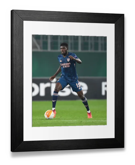 Framed Print : Thomas Partey in Action: Arsenal vs Rapid Vienna, UEFA Europa League 2020-21 Framed Print : Thomas Partey in Action: Arsenal vs Rapid Vienna, UEFA Europa League 2020-21