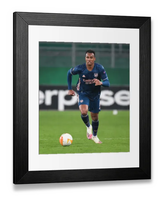 Framed Print : Gabriel in Action: Arsenal vs Rapid Vienna, UEFA Europa League 2020-21
