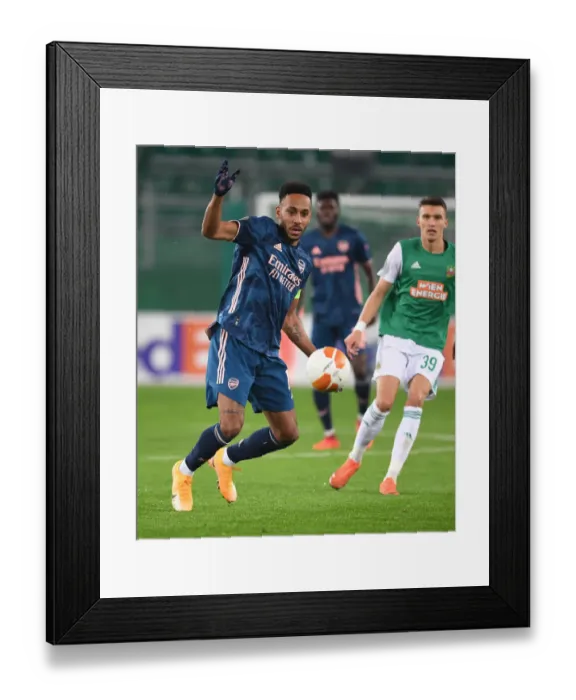 Framed Print : Arsenal's Aubameyang Scores Stunner in Europa League Showdown vs. Rapid Vienna