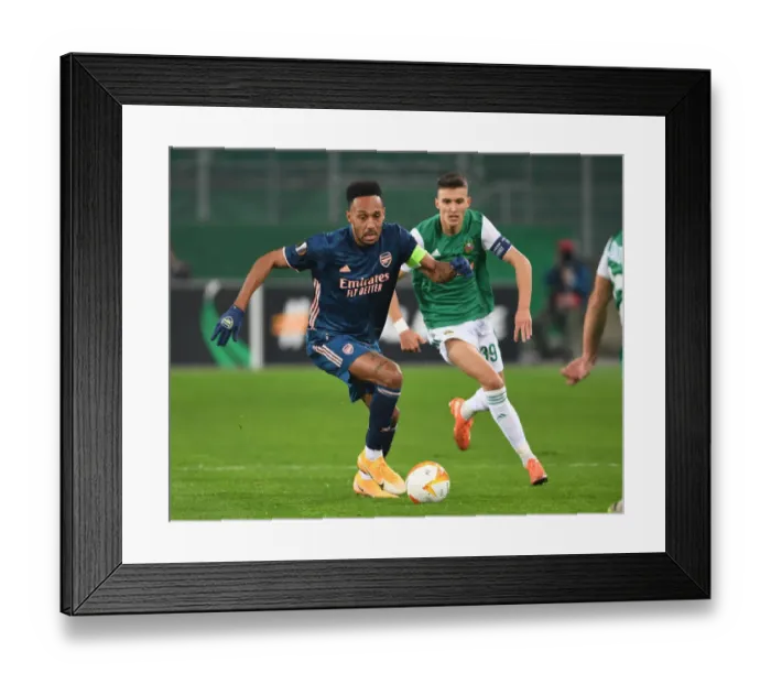 Framed Print : Aubameyang's Brilliant Breakthrough: Arsenal's Europa League Victory over Rapid Vienna