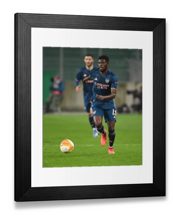 Framed Print : Thomas Partey in Action: Arsenal vs Rapid Vienna, UEFA Europa League 2020-21 Framed Print : Thomas Partey in Action: Arsenal vs Rapid Vienna, UEFA Europa League 2020-21