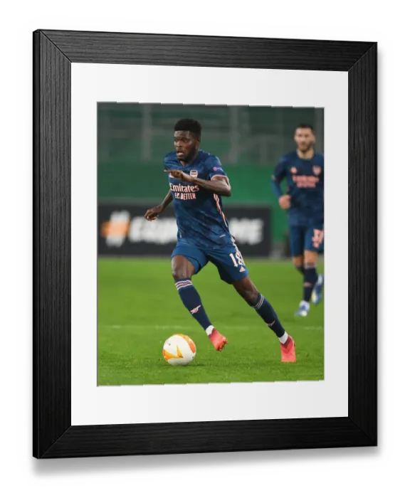Framed Print : Thomas Partey in Action: Arsenal vs Rapid Vienna, UEFA Europa League 2020-21